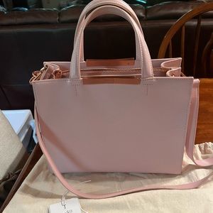 Ted Baker light pink purse. Handles and shoulder strap. Like new condition.